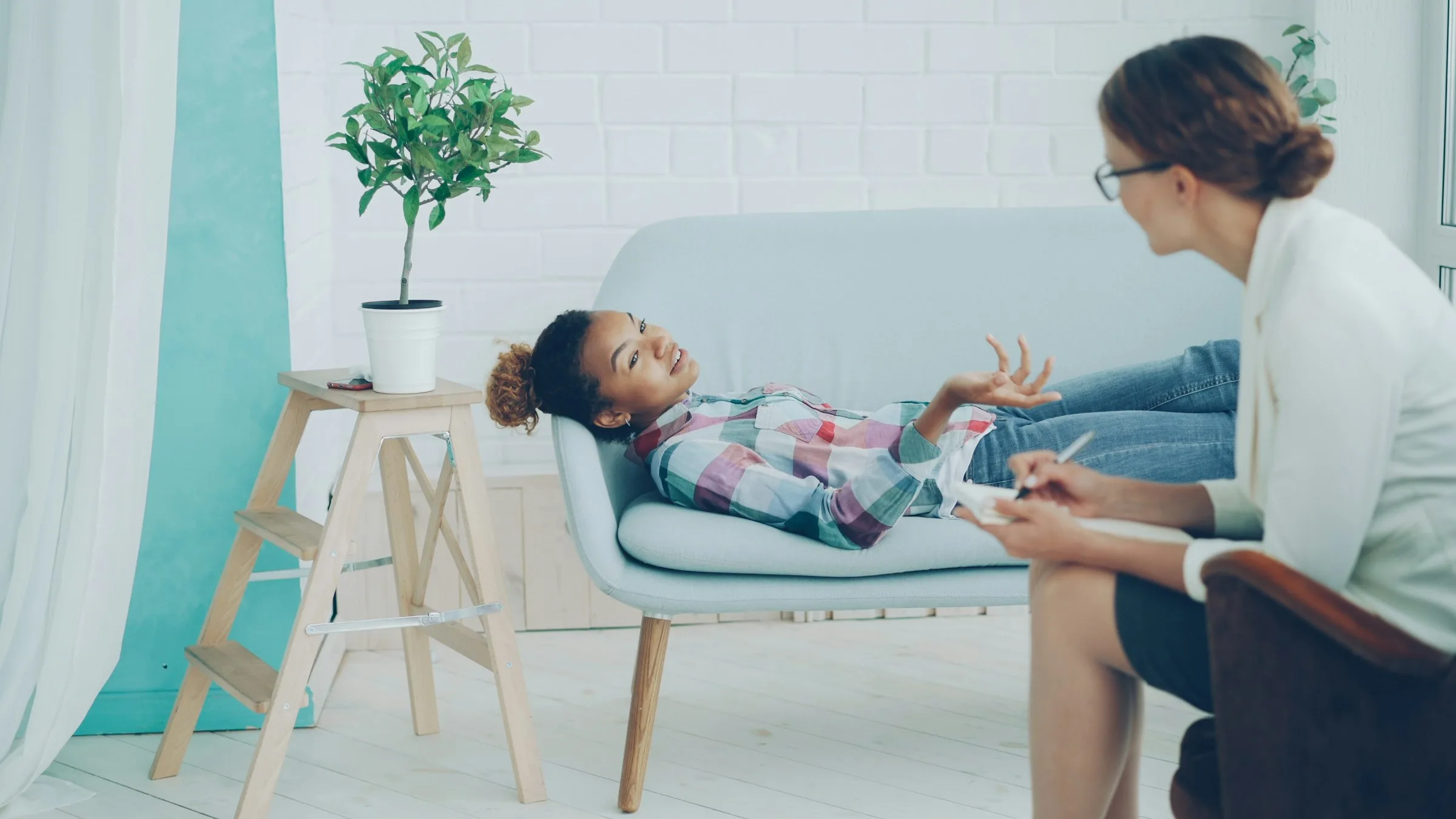 Girl talking with a therapist during a counseling session